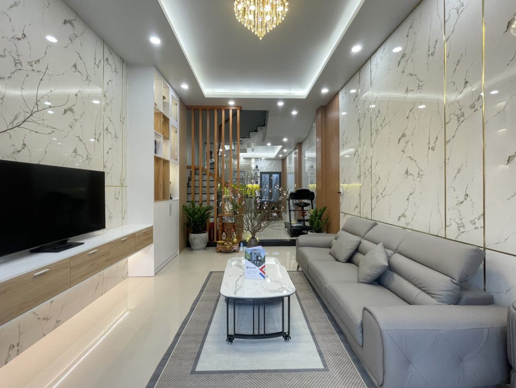 Phòng khách hiện đại với cách thiết kế mở sử dụng các vật liệu trang trí cao cấp