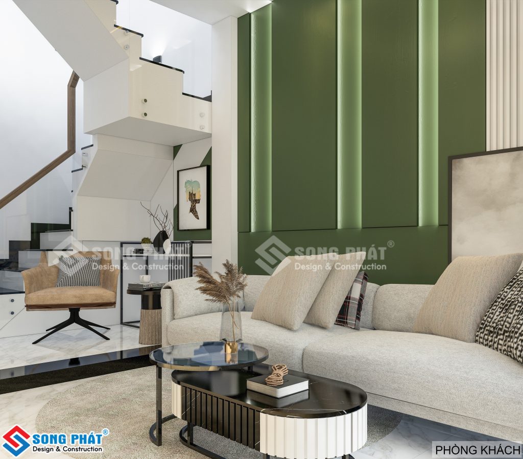 Phòng khách sử dụng tone màu xanh lá tạo cảm giác tươi mát và dễ chịu