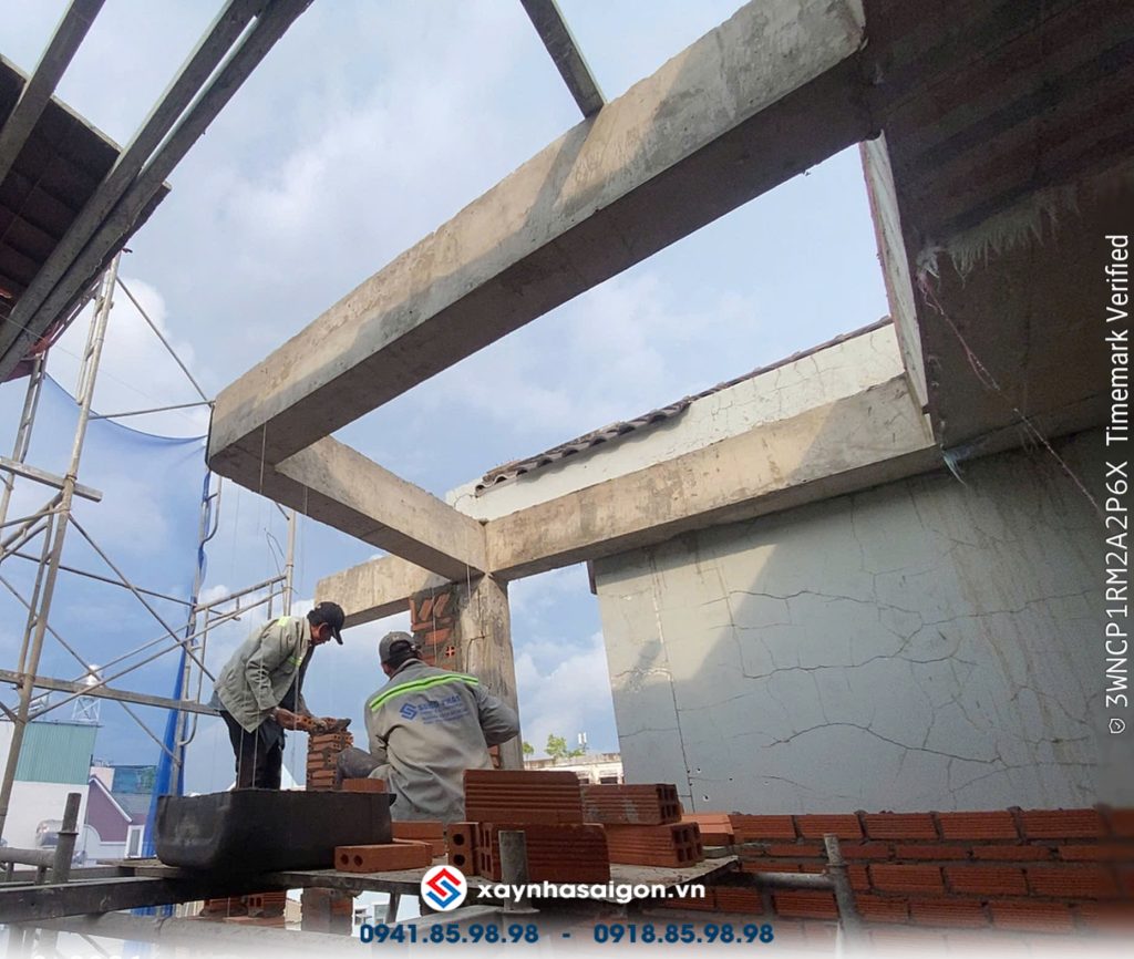 12/09 xây tường ngăn lầu 2.