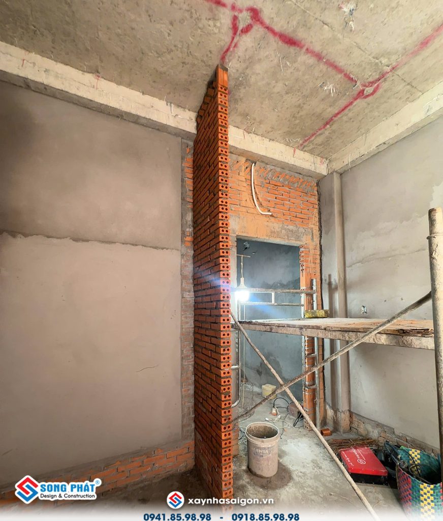 21/07 xây vách ngăn tủ.